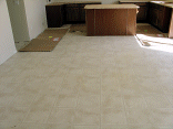 Linoleum in the kitchen and dining area.