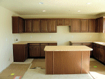 Kitchen cabinets and island.