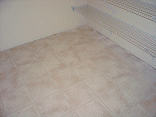 Closeup of the linoleum in the laundry room.