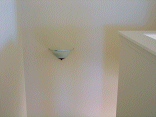 Wall sconce in the stairwell.