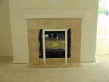 Tile around the fireplace.