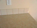 Tile backsplash in the kitchen.