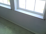Closeup of the window sill trim.