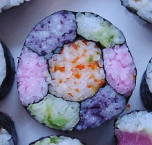 A flower. The different colors were made with various natural additions to the rice.